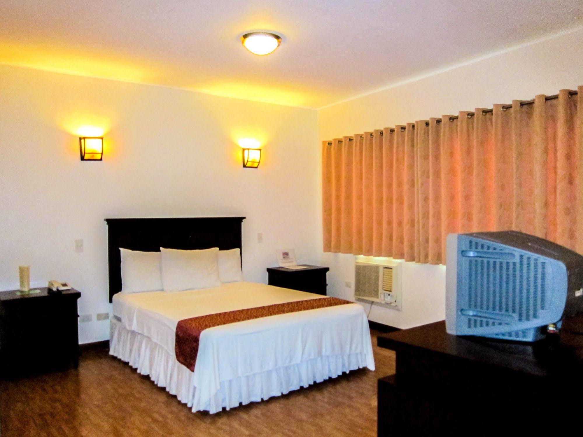 ออฟตานา สวีทส์ Hotel มันดาเวซิตี้ ภายนอก รูปภาพ