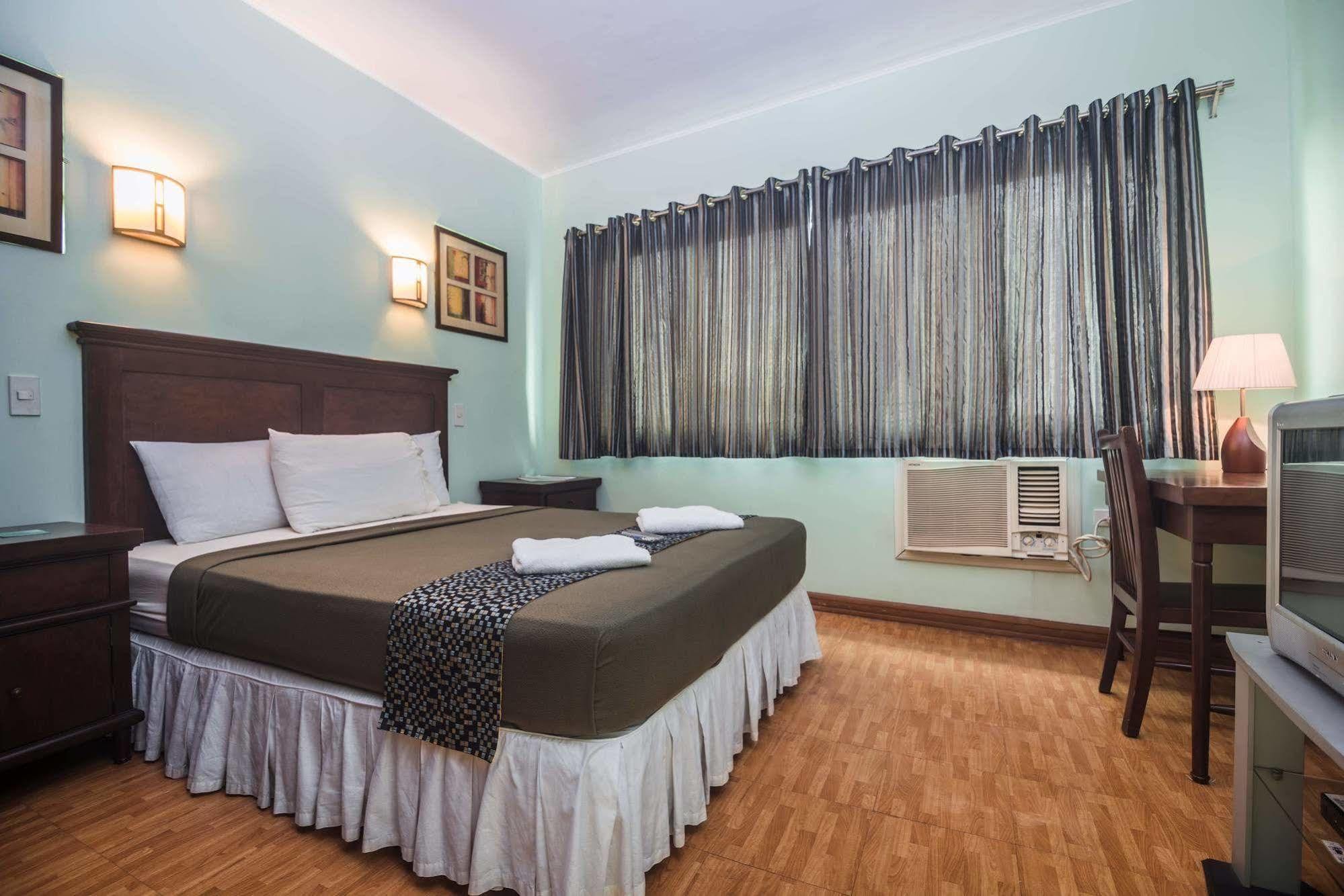 ออฟตานา สวีทส์ Hotel มันดาเวซิตี้ ภายนอก รูปภาพ